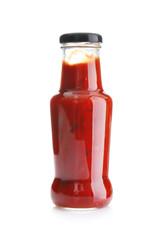 Bottle with tasty sauce on white background