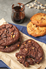 Tasty chocolate cookies on grey table