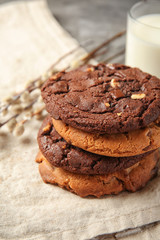 Stack of tasty cookies on table