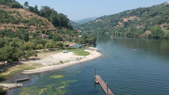 Zoom out dronie from Porto de Rei