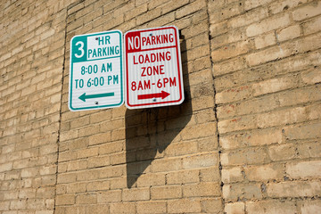 loading zone no parking sign