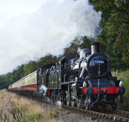 Fototapeta na wymiar Steam locomotive train express double header 