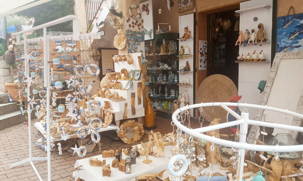stand with wooden objects for sale