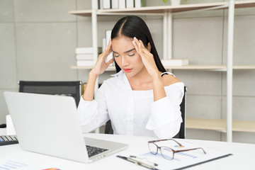 Business woman ired from work in the office