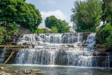 Waterfall at park in summer