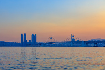Colorful sunset over Gwangandaegyo (Diamond Bridge), a suspension bridge, Busan city, Korea