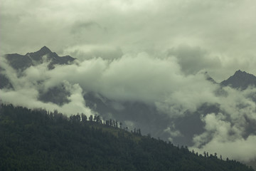 heavy dark cloud on the hills and top mountains