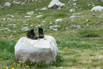 Hiking Boots On Boulder