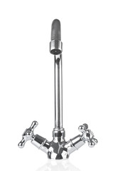 Modern faucet close up on white background