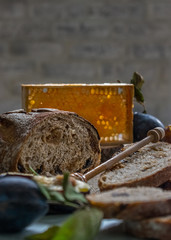 Bread dried fruit honey in honeycombs plum