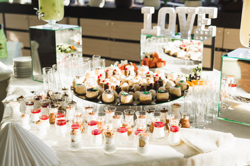 Different kinds of baked sweets on a buffet