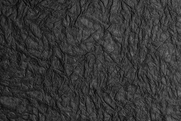 black crumpled paper texture background handmade