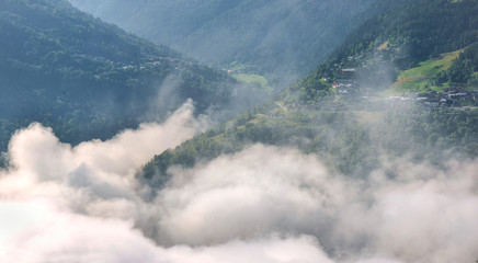 white clouds in valley