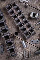 Industrial driving roller chain. Part of the chain drive of machine-building mechanism.