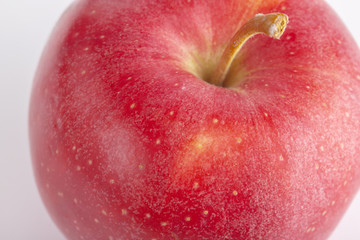 red ripe apples on a white background