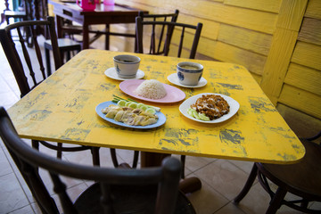 Fried chicken and Boiled chicken, Bitter soup with rice delicious breakfast prepared on the table to eat