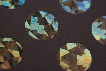 circle color hologram grafic elemente on paper texture
