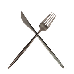 Knife and fork crossed on a white background.