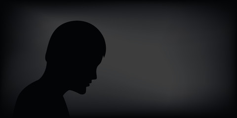 sad depressed man silhouette on black background