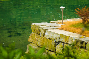Garden decoration near lake water
