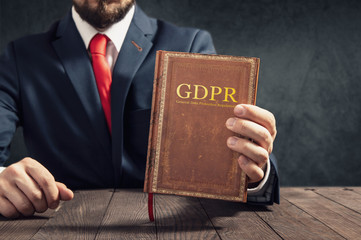 Lawyer shows General Data Protection Regulation statute book.