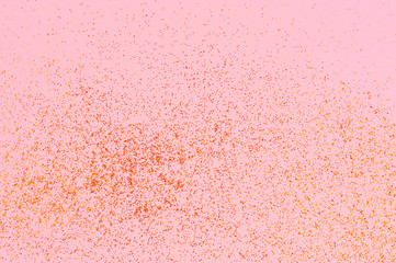 Pink background with golden sequins