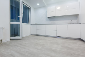 Detail of a fancy kitchen counter top and cupboards panorama