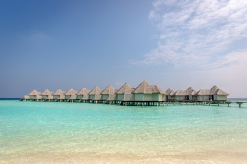 Obraz premium Hotel in Paradise - Bungalows over the water