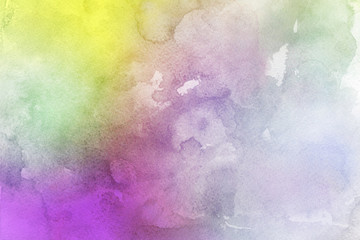 Colorful watercolor ombre leaks and splashes texture on white watercolor paper background. Natural organic shapes and design.