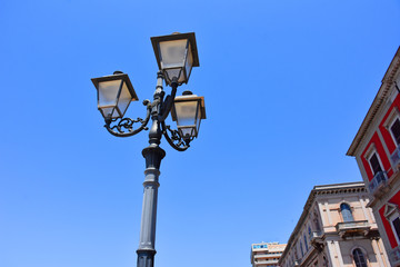 Italy, Puglia region, Taranto, street lamps for street lighting in the city and seafront.