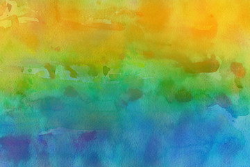 Colorful watercolor ombre leaks and splashes texture on white watercolor paper background. Natural organic shapes and design.