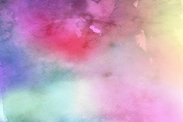 Colorful watercolor ombre leaks and splashes texture on white watercolor paper background. Natural organic shapes and design.