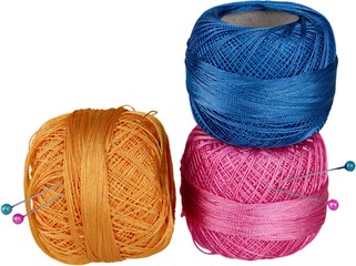Balls of thread with sewing pins