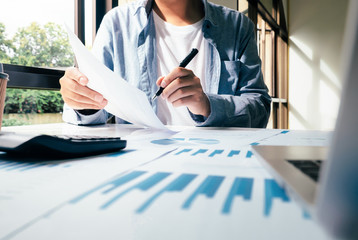 Businessman analyse investment marketing data.