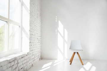 Light minimalism modern scandinavian loft studio interior with cafe furniture chair against white...