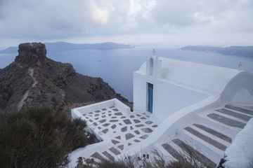 Greek church with a stunning view in Santorini island,Greece