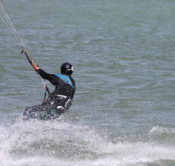 Naklejka premium kitesurfer riding board