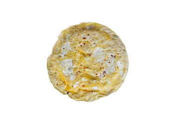 Fried eggs with spices isolated on white background.