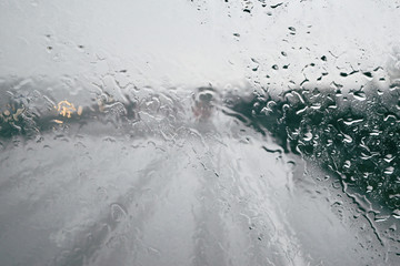 heavy rain drops on window