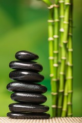 Obraz premium Balancing Pebbles with Bamboo