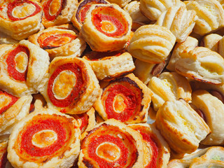 Mix of delicious appetizers and small pizzas made of puff pastry
