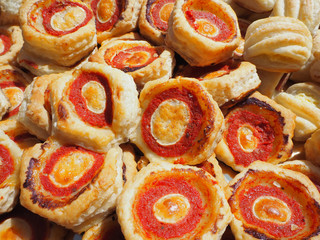 Mix of delicious appetizers and small pizzas made of puff pastry