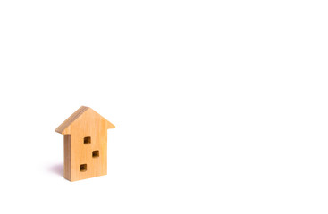 Obraz na płótnie Canvas Wooden figure of a multi-storey house on a white background. Three-story house. Buying and selling of real estate, construction. Apartments and apartments. Minimalism. for presentations.