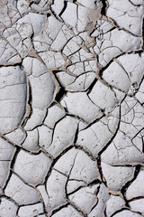 Texture, background of dry cracked earth ground. Global shortage of water on planet. Deep cracks in...