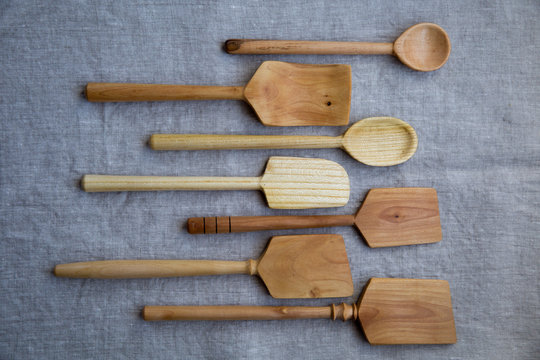 Wooden spoons on cloth