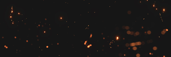 blurred sparks from fire in front of black backgound - obrazy, fototapety, plakaty