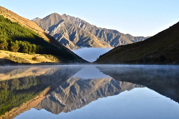 Mountain reflection in a lake in New Zealand near Queesntown