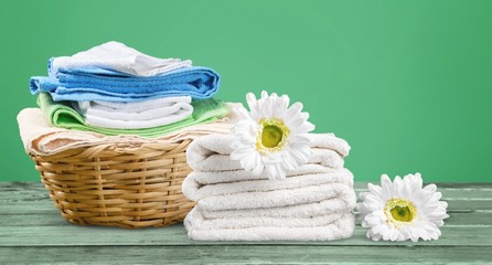 Obraz na płótnie Canvas Laundry Basket with towels