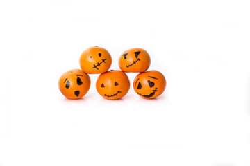 Horizontally background for Halloween with different tangerines pumpkins
