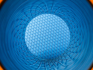 Background texture of blue scales in a circle